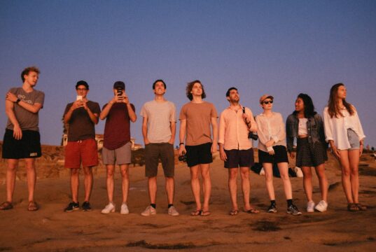 Team building al mare: come organizzarlo e cosa non dimenticare teli mare personalizzati